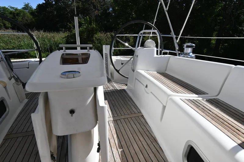 Liberty Yacht Photos Pics Beneteau Oceanis 50 sailboat cockpit, 2011 model, featuring dual steering wheels and teak decking.