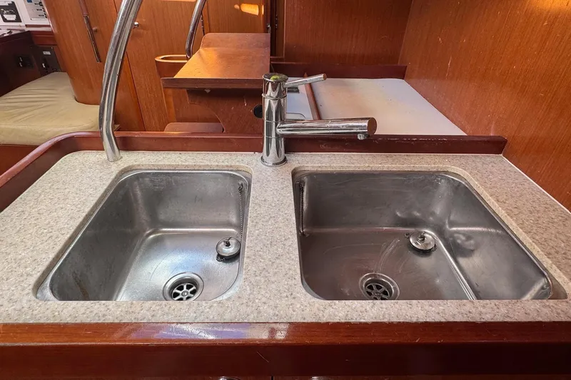 Liberty Yacht Photos Pics Dual stainless steel sinks in 2011 Beneteau Oceanis 50 yacht kitchen.