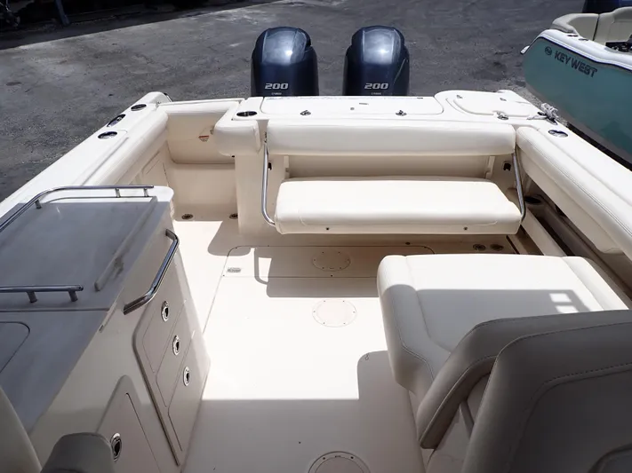  Yacht Photos Pics 2019 Grady-White Freedom 275 boat interior with dual 200 HP engines.