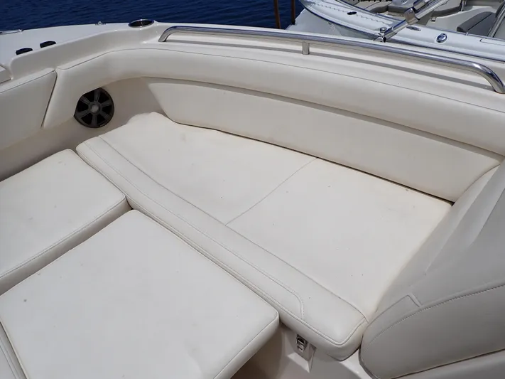  Yacht Photos Pics 2019 Grady-White Freedom 275 boat with spacious white cushioned seating.
