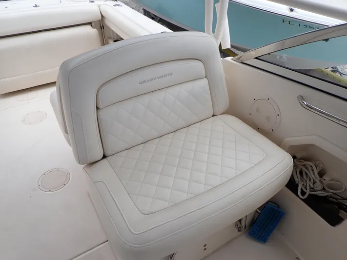  Yacht Photos Pics 2019 Grady-White Freedom 275 boat with white cushioned seating.
