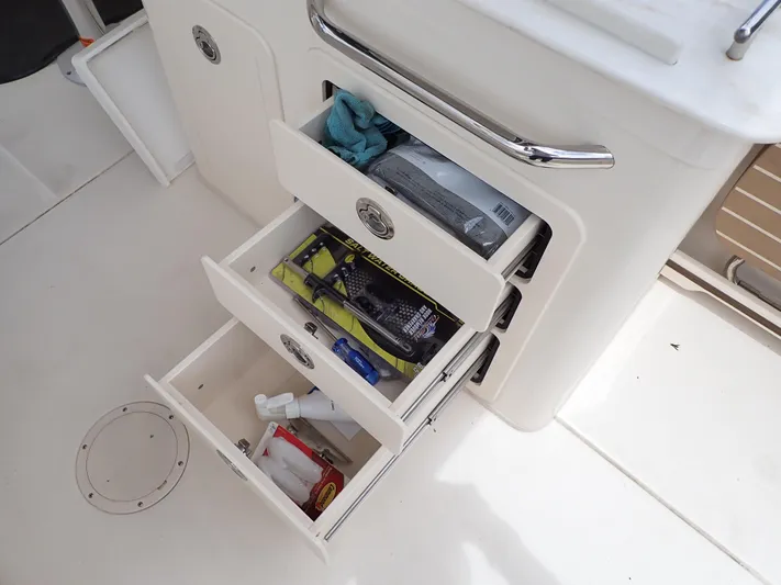  Yacht Photos Pics Open storage drawers on a 2019 Grady-White Freedom 275 boat.