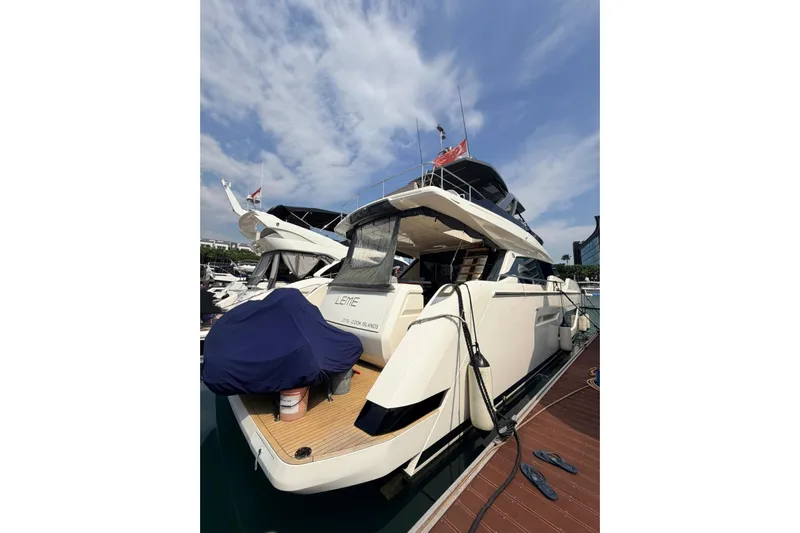  Yacht Photos Pics Luxury 2020 Ferretti Yachts 720 docked under a clear sky.
