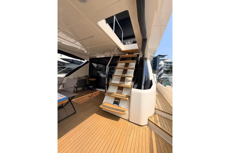  Yacht Photos Pics Luxurious 2020 Ferretti Yachts 720 with elegant wooden deck and modern staircase.