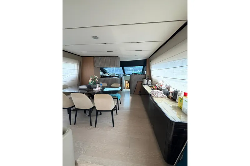  Yacht Photos Pics Luxurious interior of 2020 Ferretti Yachts 720, featuring elegant dining and modern amenities.