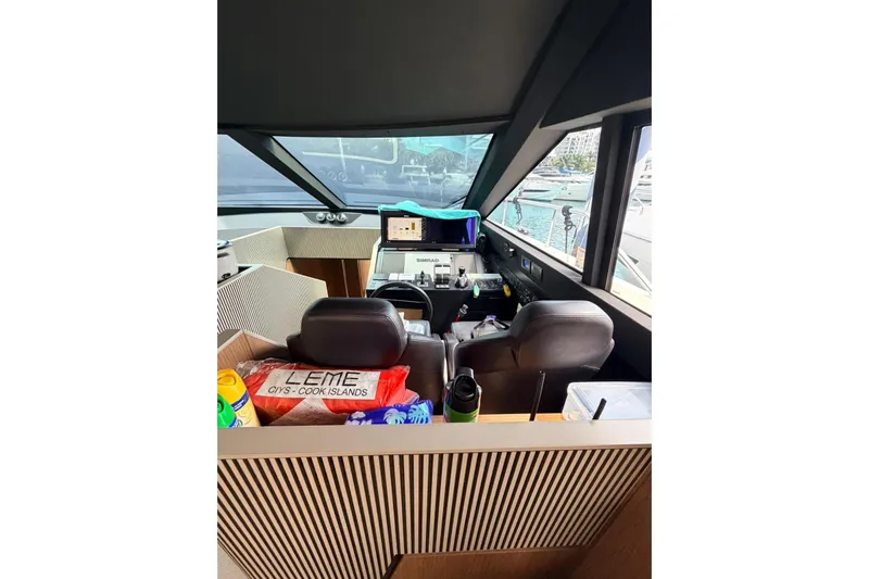  Yacht Photos Pics Interior view of 2020 Ferretti Yachts 720 cockpit with navigation equipment.