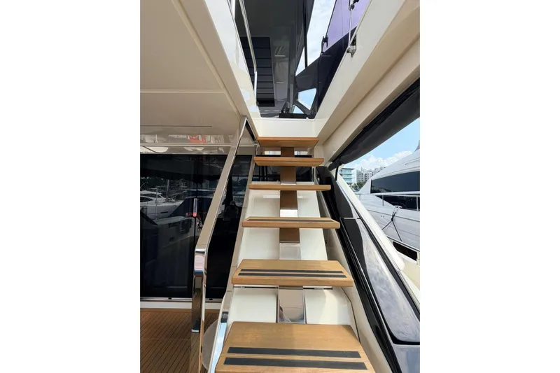  Yacht Photos Pics Staircase on 2020 Ferretti Yachts 720, featuring sleek wooden steps and modern design.
