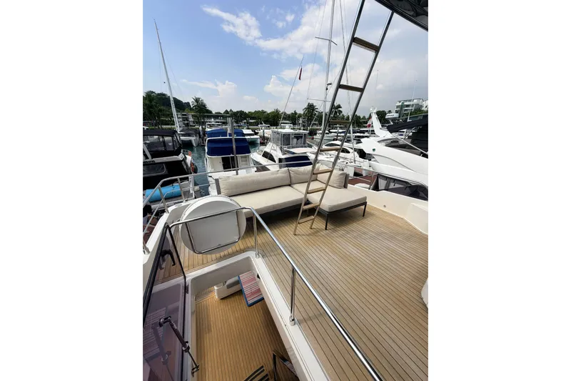  Yacht Photos Pics Luxurious 2020 Ferretti Yachts 720 at marina, featuring spacious deck and elegant design.