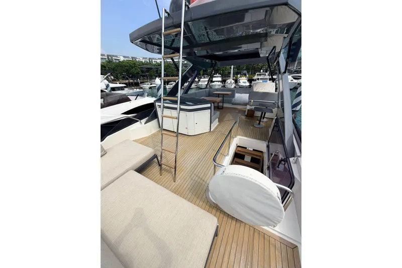  Yacht Photos Pics Luxurious 2020 Ferretti Yachts 720 deck with seating and ladder, docked at marina.