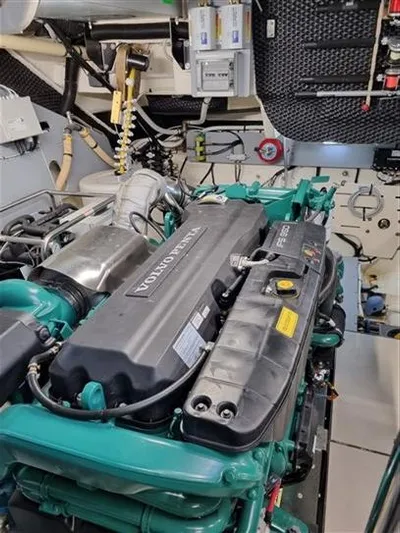  Yacht Photos Pics Engine room of 2019 Cranchi 60HT yacht featuring a Volvo Penta engine.