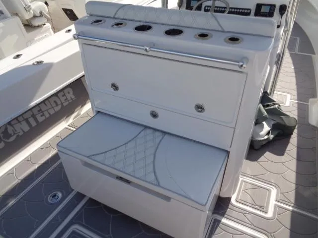  Yacht Photos Pics 2022 Contender 32 ST boat interior with storage and seating.