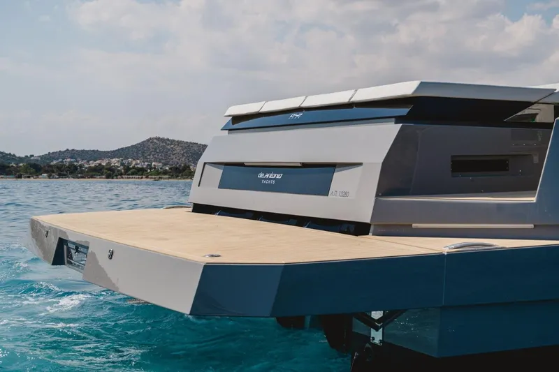  Yacht Photos Pics 2023 De Antonio Yachts D42 Open on water, showcasing sleek design and modern features.