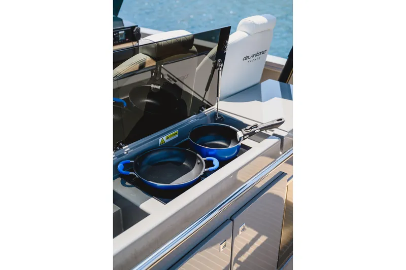  Yacht Photos Pics Outdoor kitchen on 2023 De Antonio Yachts D42 Open with cookware and sea view.