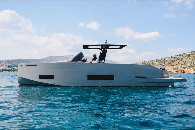  Yacht Photos Pics 2023 De Antonio Yachts D42 Open cruising on clear blue water.