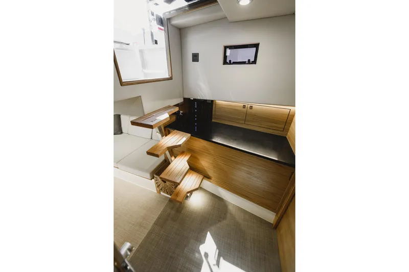  Yacht Photos Pics Interior of 2023 De Antonio Yachts D42 Open, featuring modern wood finishes and sleek design.