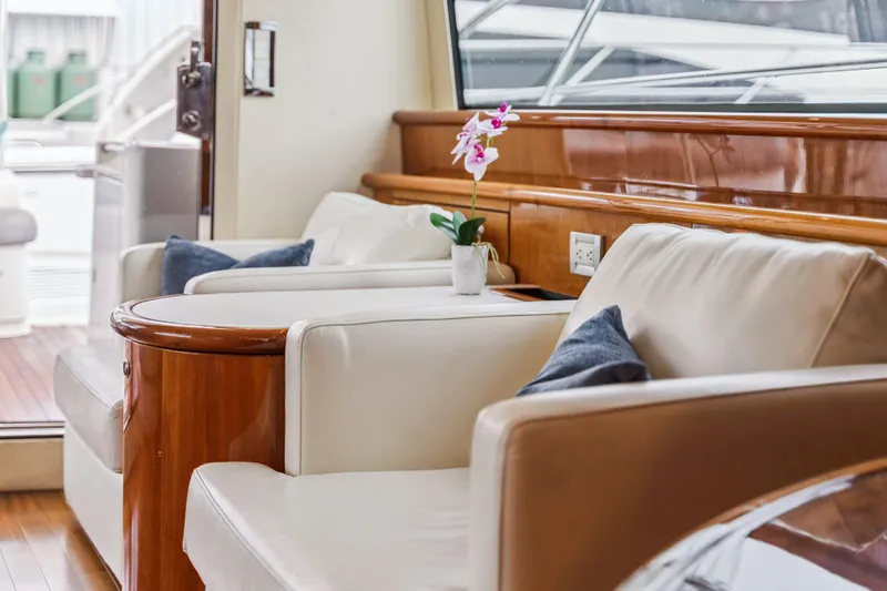 Day To Day Yacht Photos Pics Luxurious interior of 2008 Neptunus 62 Flybridge yacht with elegant seating and decor.