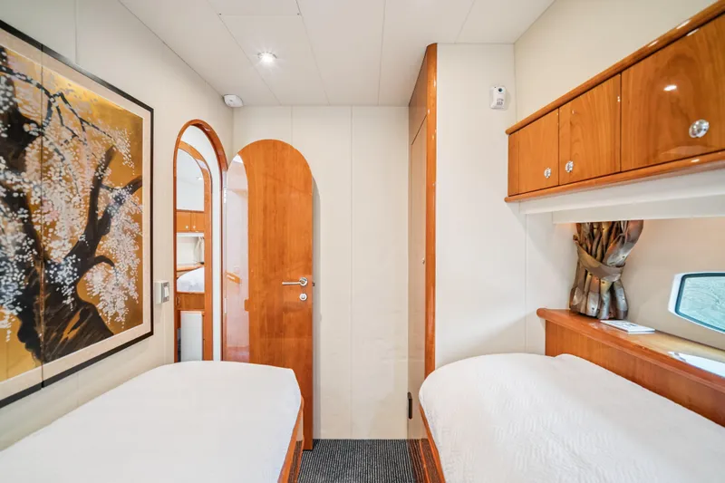 Day To Day Yacht Photos Pics Luxurious 2008 Neptunus 62 Flybridge yacht cabin with elegant wood finishes and modern decor.