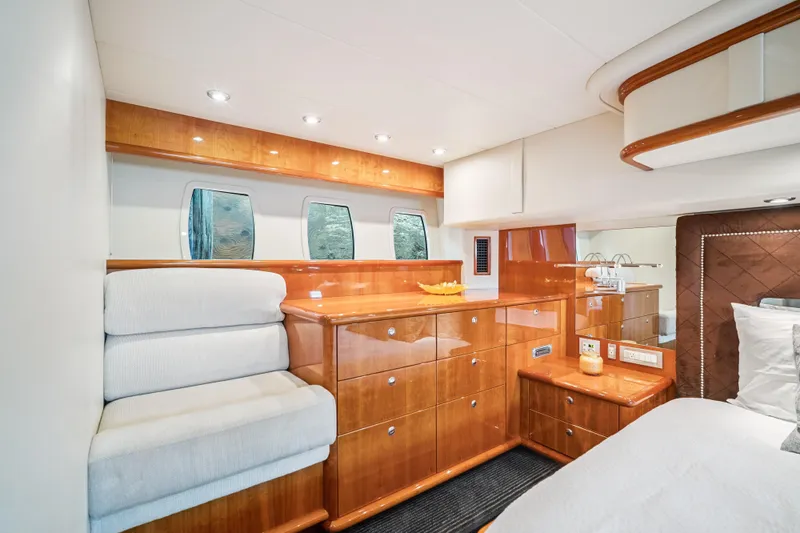 Day To Day Yacht Photos Pics Luxurious cabin interior of 2008 Neptunus 62 Flybridge yacht with elegant wood finish.