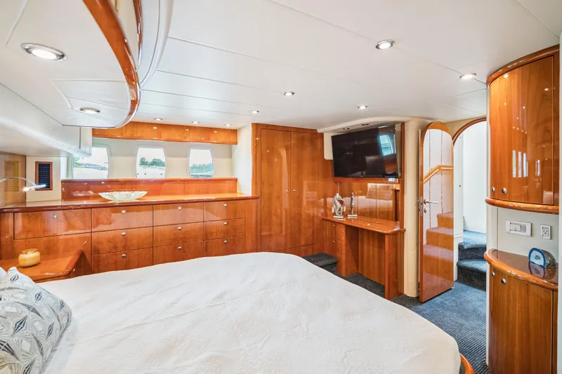 Day To Day Yacht Photos Pics Luxurious 2008 Neptunus 62 Flybridge yacht interior with elegant wood finish and modern amenities.