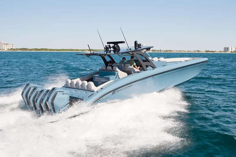  Yacht Photos Pics 2023 Midnight Express 43' Open boat cruising on the ocean with multiple engines.