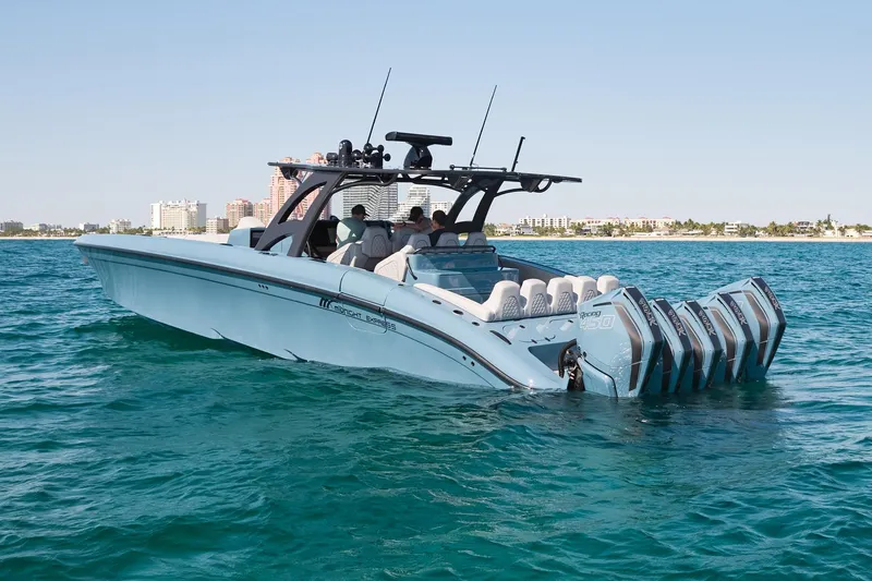  Yacht Photos Pics 2023 Midnight Express 43' Open boat cruising on clear blue water.