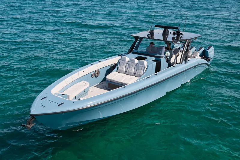  Yacht Photos Pics 2023 Midnight Express 43' Open boat cruising on clear blue water.