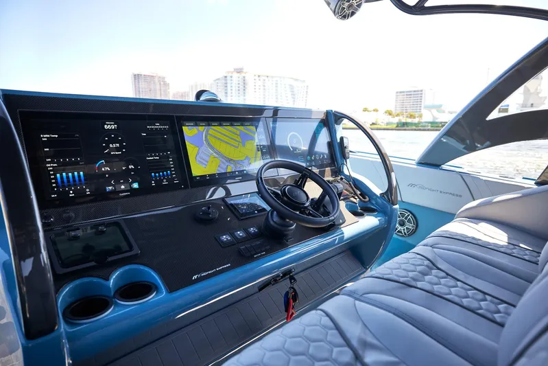  Yacht Photos Pics 2023 Midnight Express 43' Open boat cockpit with advanced navigation system and luxurious seating.