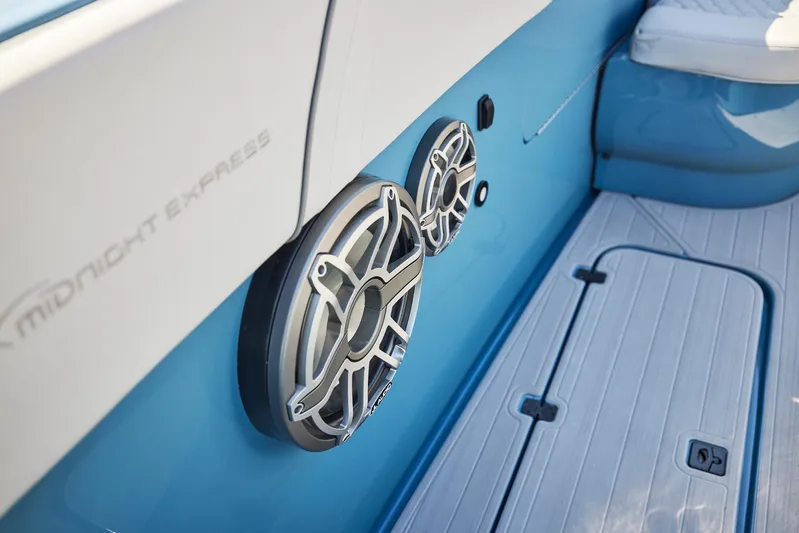  Yacht Photos Pics 2023 Midnight Express 43' Open boat interior with speakers and blue detailing.