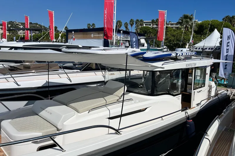  Yacht Photos Pics Luxury Nimbus C11 boat at a marina, 2025 model, with sleek design and sunshade.