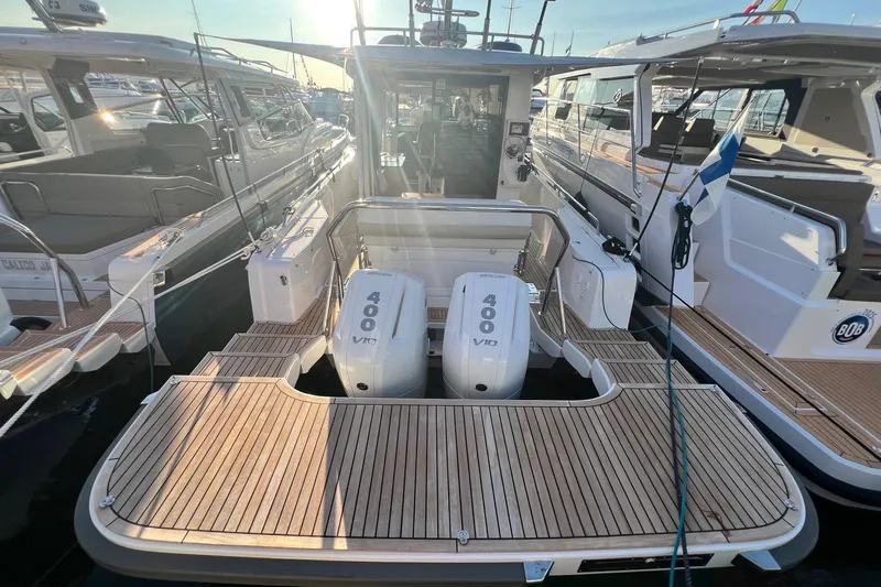  Yacht Photos Pics Nimbus C11 2025 yacht with twin Mercury 400 V10 engines at a marina.