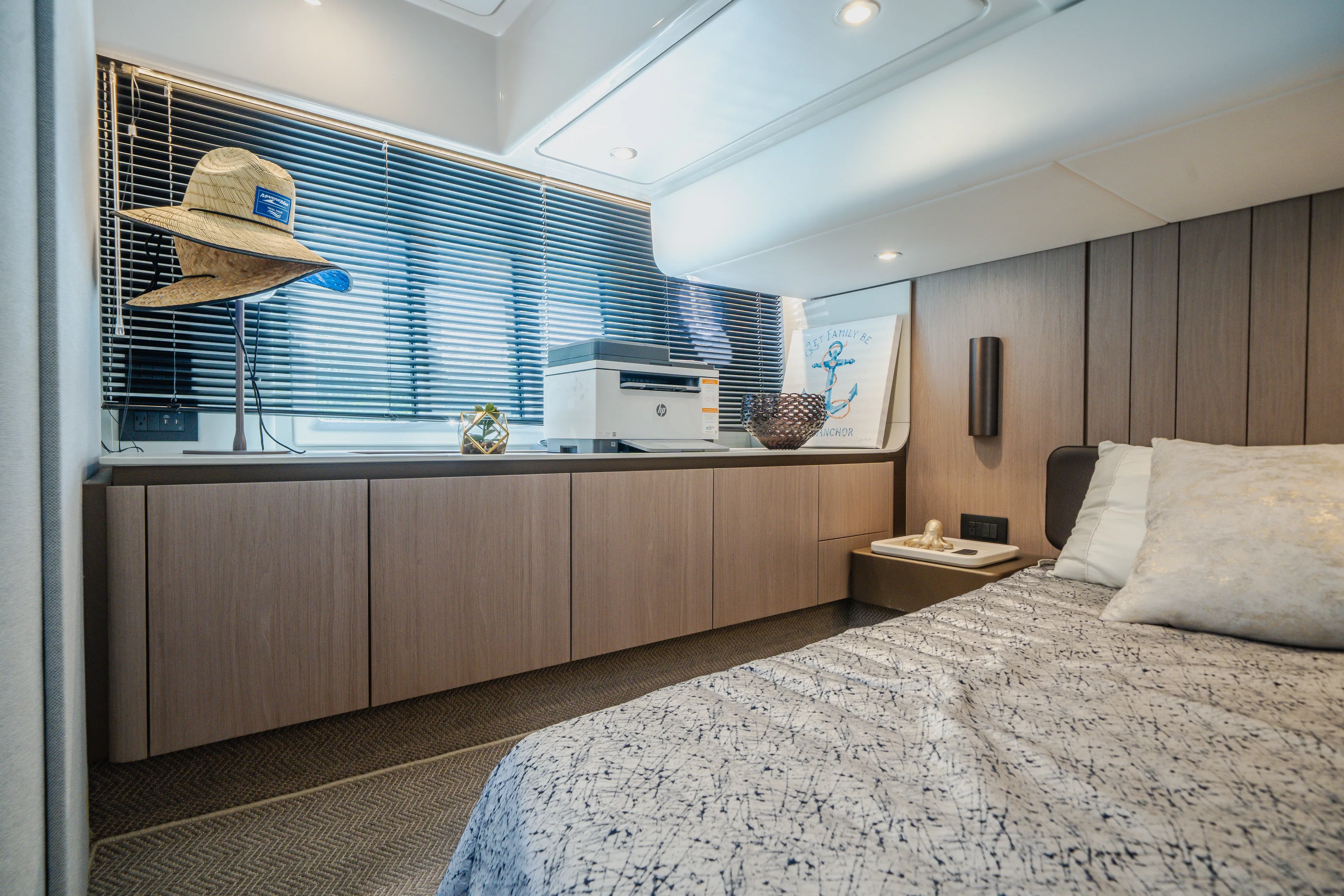  Yacht Photos Pics Luxurious interior of 2022 Azimut 50 Fly yacht bedroom with modern decor and natural lighting.