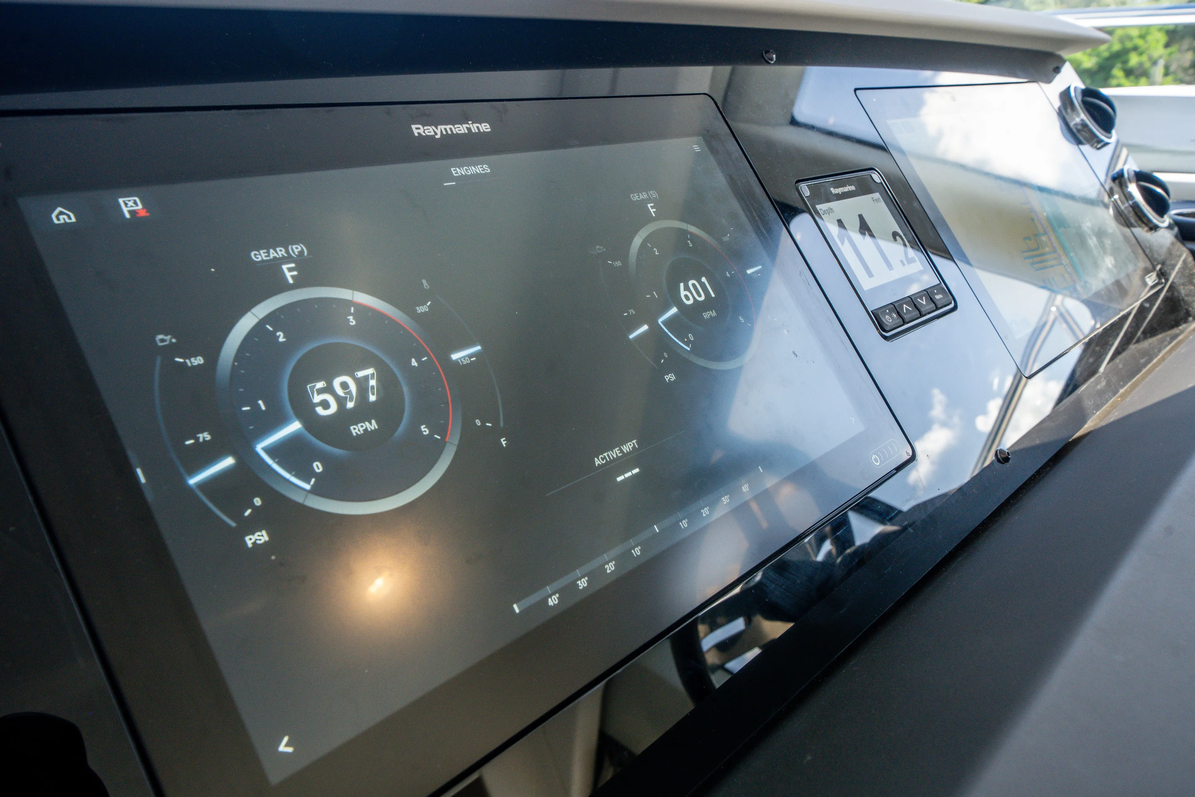  Yacht Photos Pics Control panel of 2022 Azimut 50 Fly yacht displaying engine RPM and navigation data.