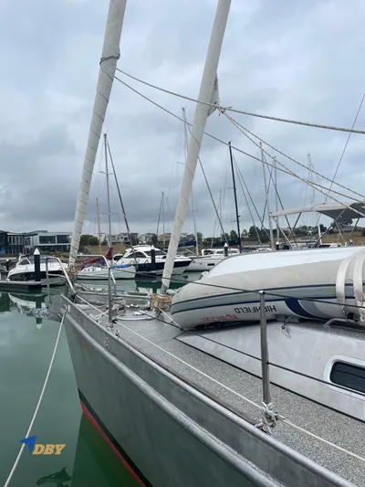 Rubicon Yacht Photos Pics Sailboat docked at marina, Radford 15.2 model, 2022, with overcast sky.