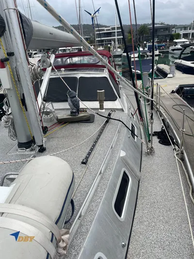Rubicon Yacht Photos Pics Sailboat Radford 15.2, 2022 model, docked at marina with visible deck and rigging.