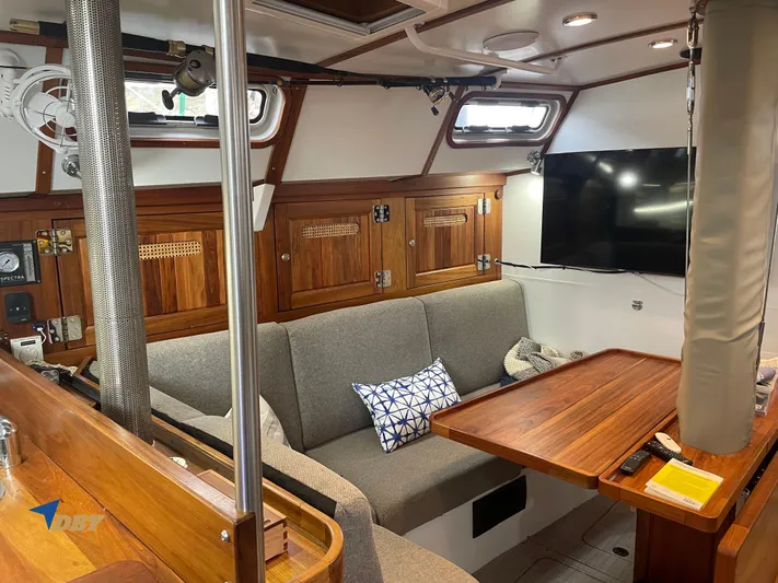 Rubicon Yacht Photos Pics Luxurious 2022 Radford 15.2 yacht interior with wooden finishes and modern amenities.