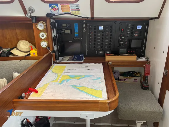 Rubicon Yacht Photos Pics Navigation station in a 2022 Radford 15.2 yacht with map and control panel.