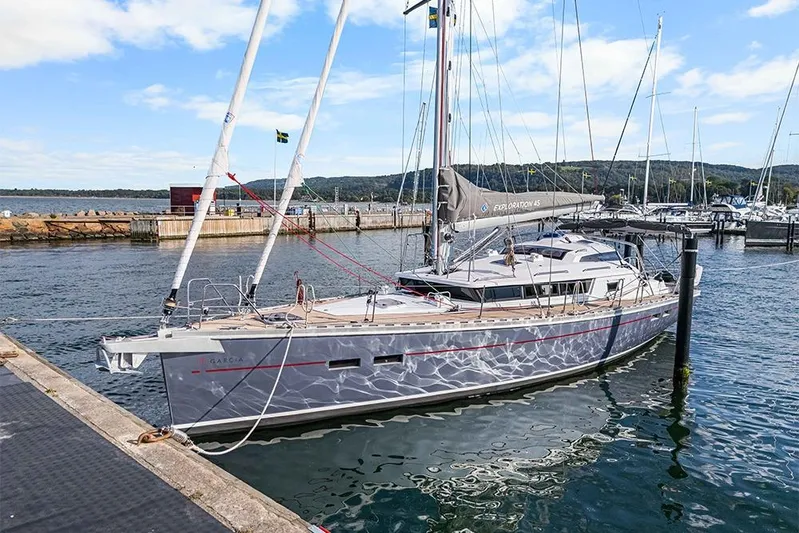  Yacht Photos Pics Sleek 2025 Garcia 45 Explorer yacht docked at a marina under a clear blue sky.