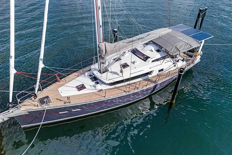  Yacht Photos Pics Garcia 45 Explorer 2025 yacht with solar panels, docked on calm water.