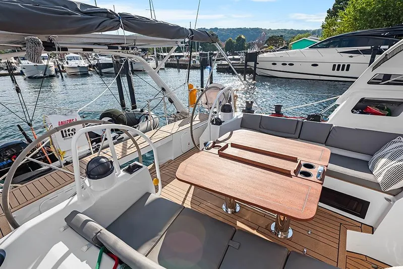  Yacht Photos Pics Luxurious Garcia 45 Explorer yacht interior, 2025 model, docked at marina with scenic background.