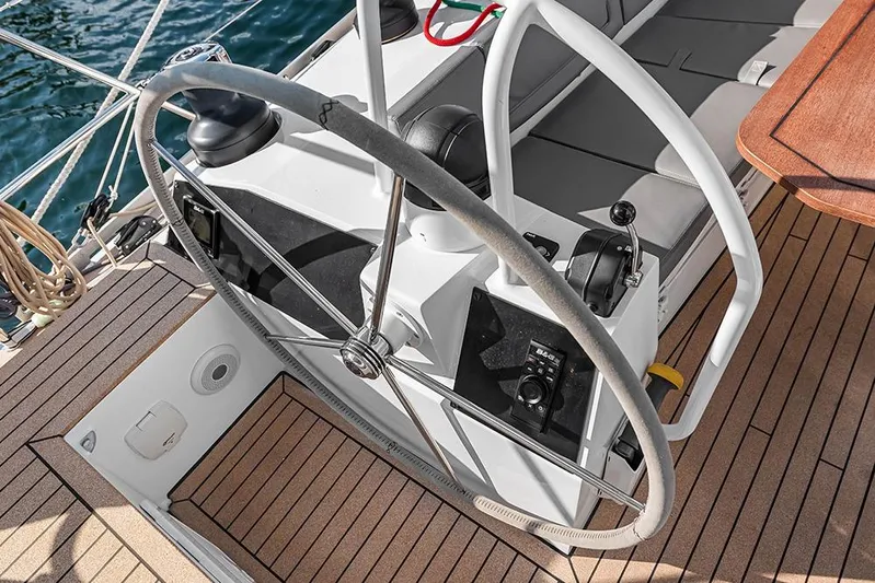  Yacht Photos Pics Steering wheel and controls of 2025 Garcia 45 Explorer yacht on teak deck.