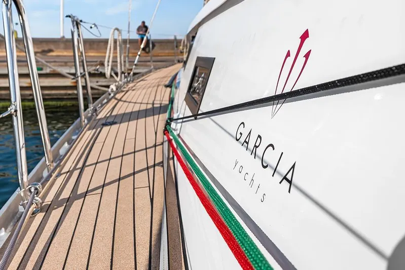  Yacht Photos Pics 2025 Garcia 45 Explorer yacht docked, showcasing sleek design and branding.