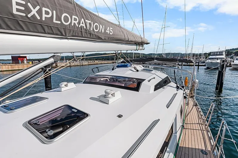  Yacht Photos Pics Sleek 2025 Garcia 45 Explorer yacht docked in a scenic marina.