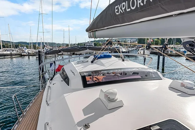  Yacht Photos Pics 2025 Garcia 45 Explorer yacht docked at marina, showcasing sleek design and spacious deck.