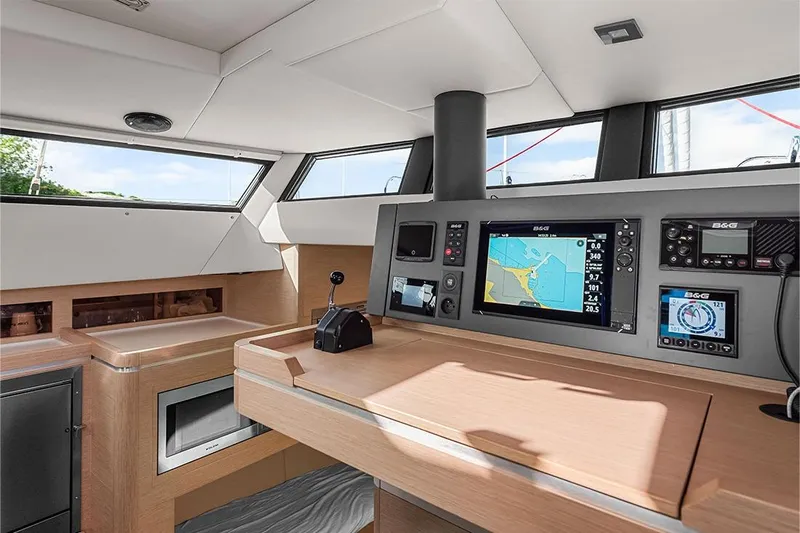  Yacht Photos Pics Modern navigation station inside 2025 Garcia 45 Explorer yacht, featuring advanced control panels and sleek design.
