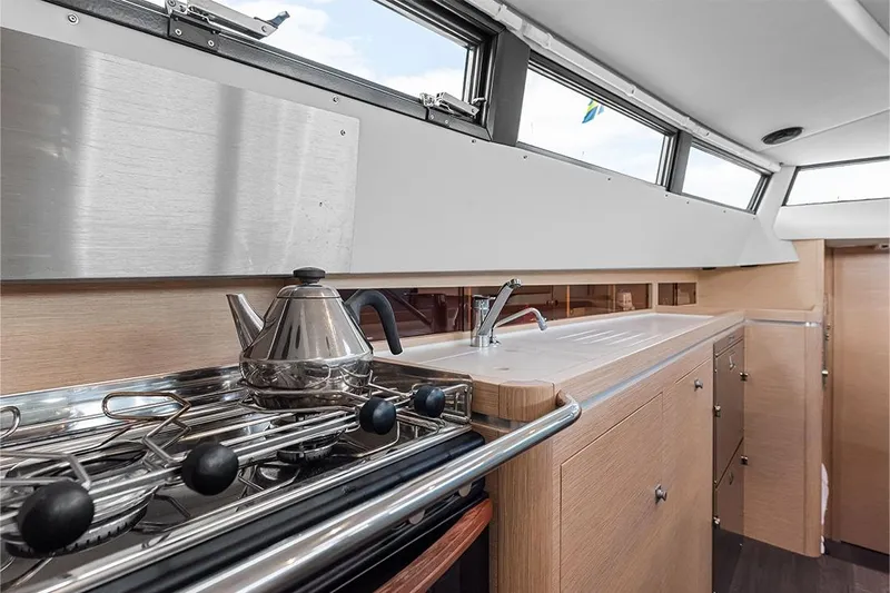  Yacht Photos Pics Modern kitchen interior of 2025 Garcia 45 Explorer yacht with stove and sink.