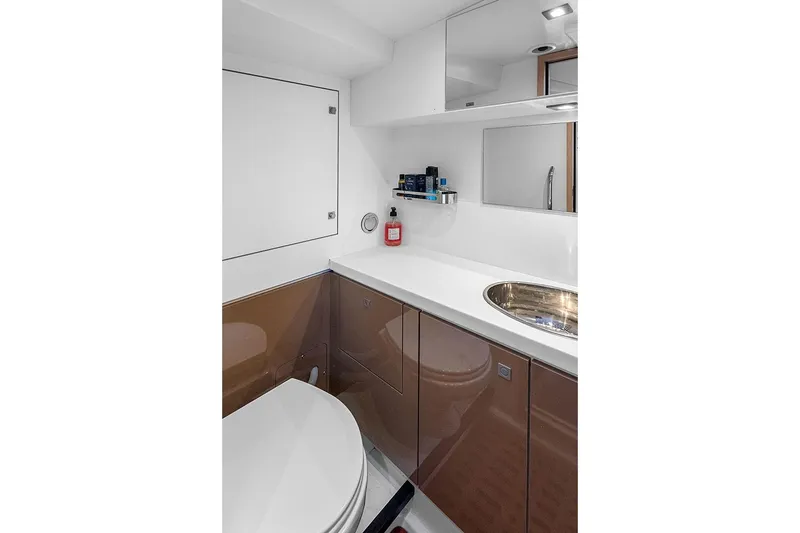  Yacht Photos Pics Modern bathroom in 2025 Garcia 45 Explorer yacht with sleek design and stainless steel sink.