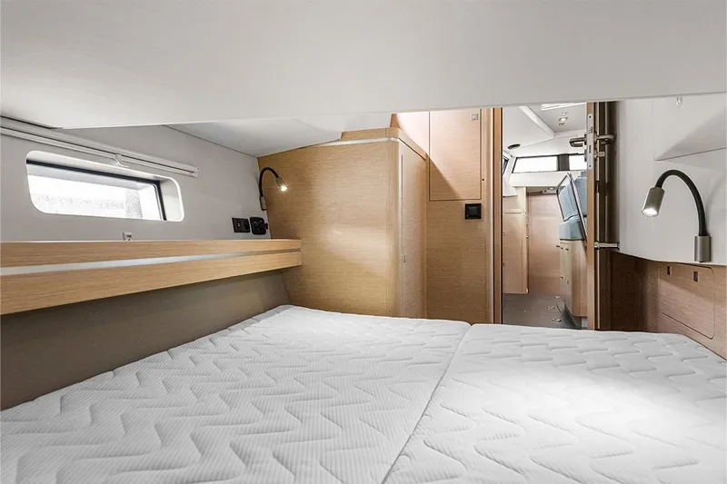  Yacht Photos Pics Interior of 2025 Garcia 45 Explorer yacht, featuring a cozy bedroom with modern design.