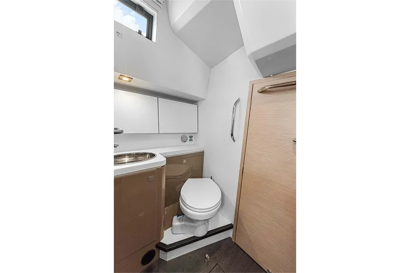  Yacht Photos Pics Modern bathroom in 2025 Garcia 45 Explorer yacht, featuring sleek design and compact amenities.