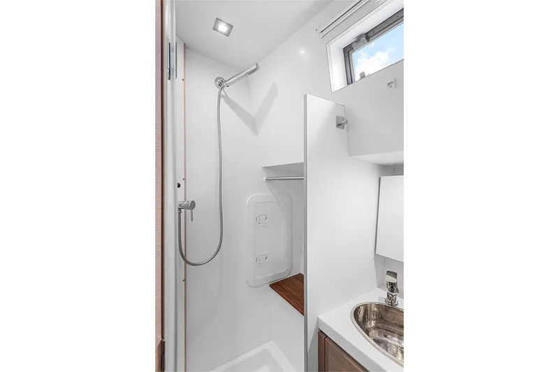  Yacht Photos Pics Modern bathroom in 2025 Garcia 45 Explorer yacht with sleek shower and sink.