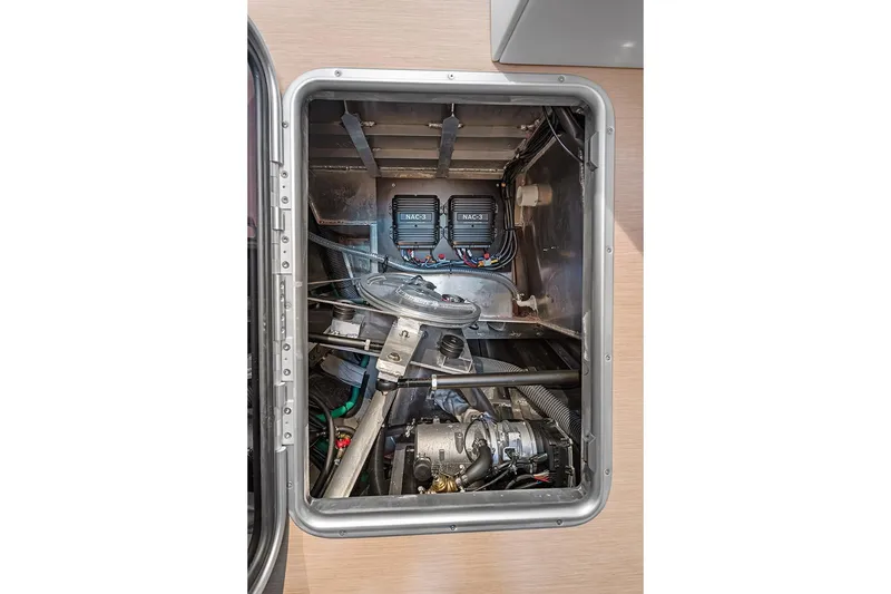  Yacht Photos Pics Engine compartment of 2025 Garcia 45 Explorer yacht, showcasing mechanical components and wiring.